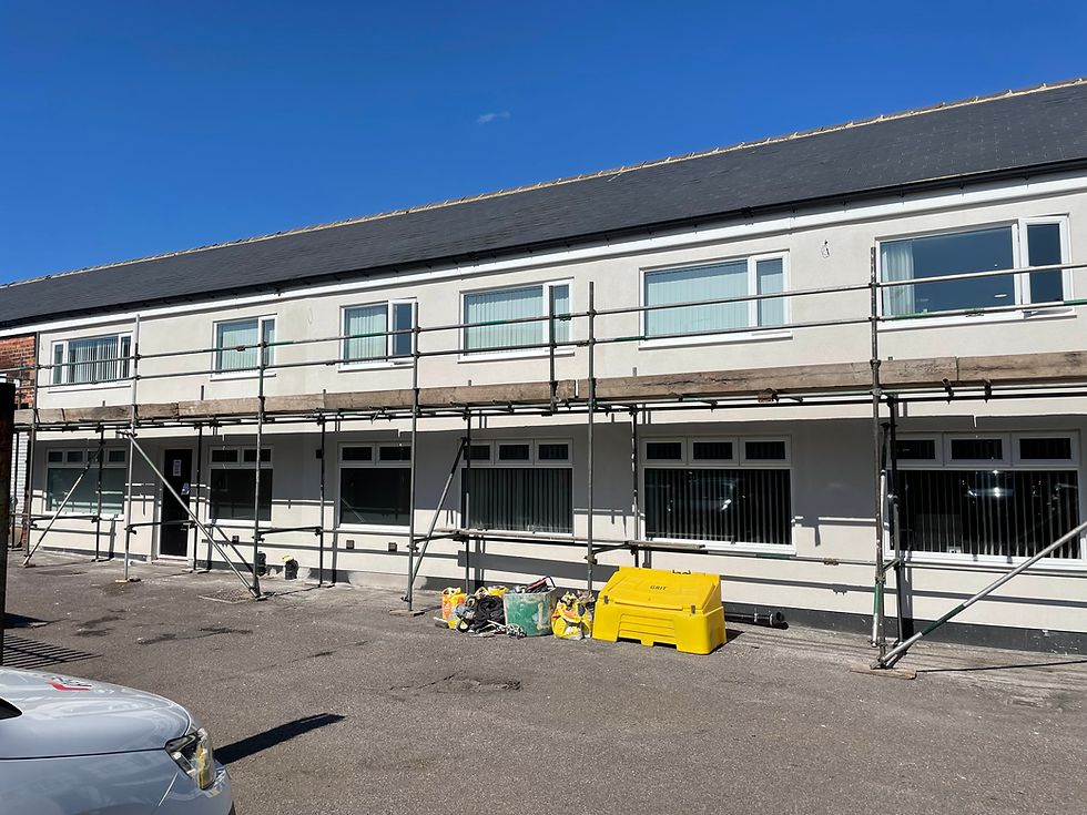 Commercial business block in Ecclesfield, Sheffield, finished with white Eco Rend MR1 monocouche render by Plaster and Rendering Solutions.