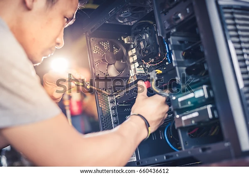 technician-hold-screwdriver-repairing-computer-600w-660436612.webp