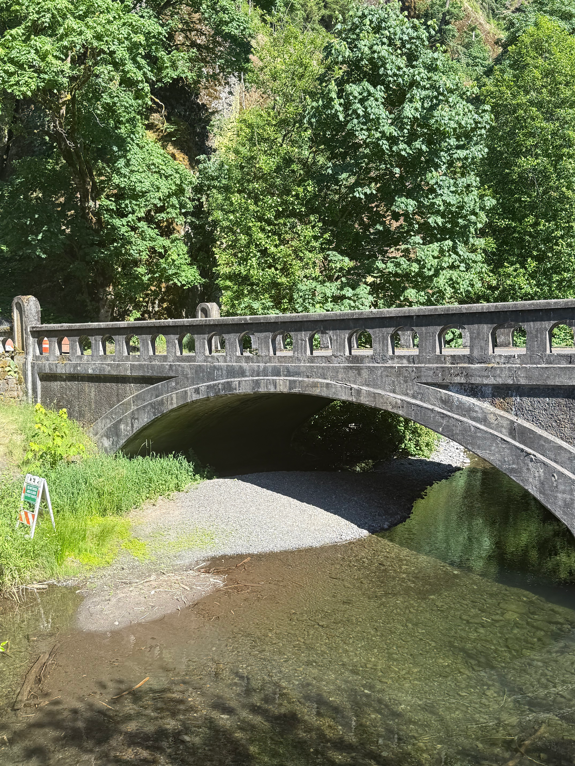 Multnomah has a stream which runs under this little bridge