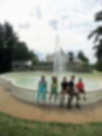 Kids sitting on a fountain in Maymont Gardens, Virginia