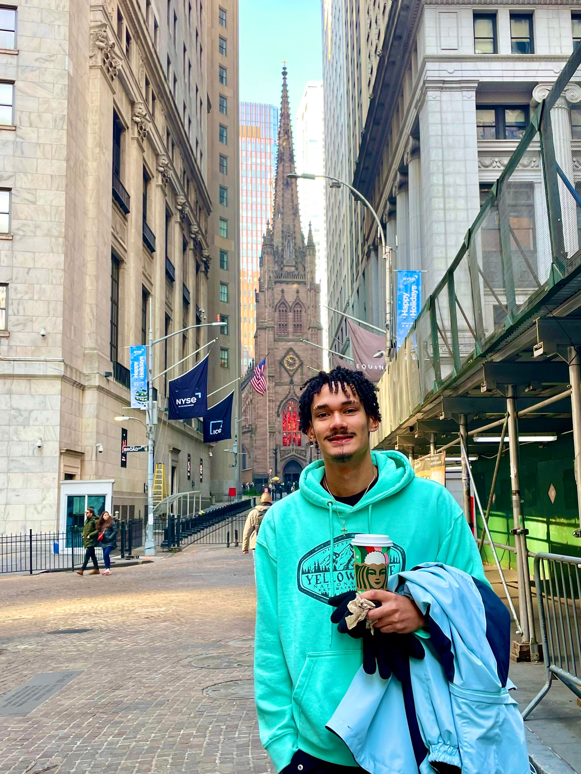young man downtown NYC the trinity church