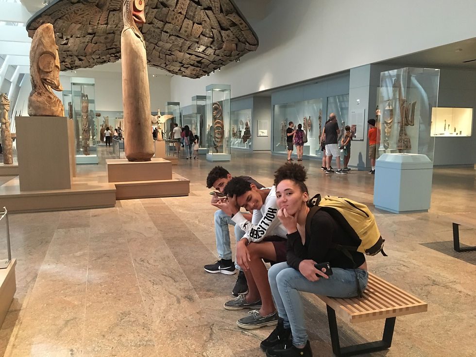 My kids, needing to rest from our hike across the MET 
