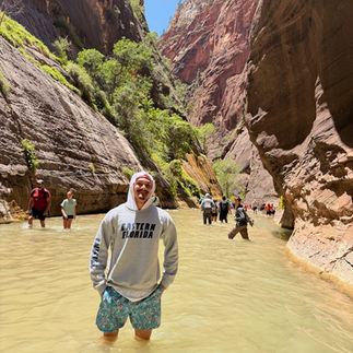 Man walking through the Narrow's in Zion