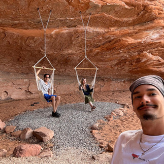 People in hammocks at the kiva Tent Cave Lakes