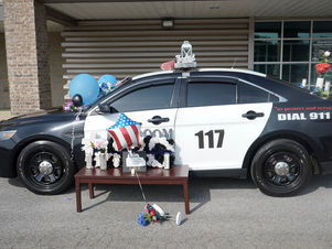 MPD Places Officer Croom's Patrol Car in front of MPD