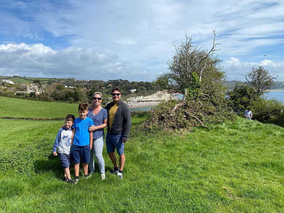 Brett, Vikki, George and William taking a walk across Beer Head in East Devon