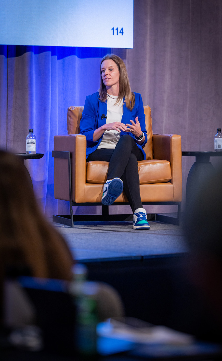 Kayla Lujan talking at a landscape conference