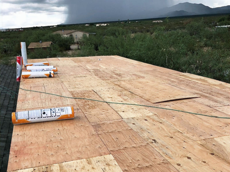 New plywood decking installed ahead of a monsoon storm