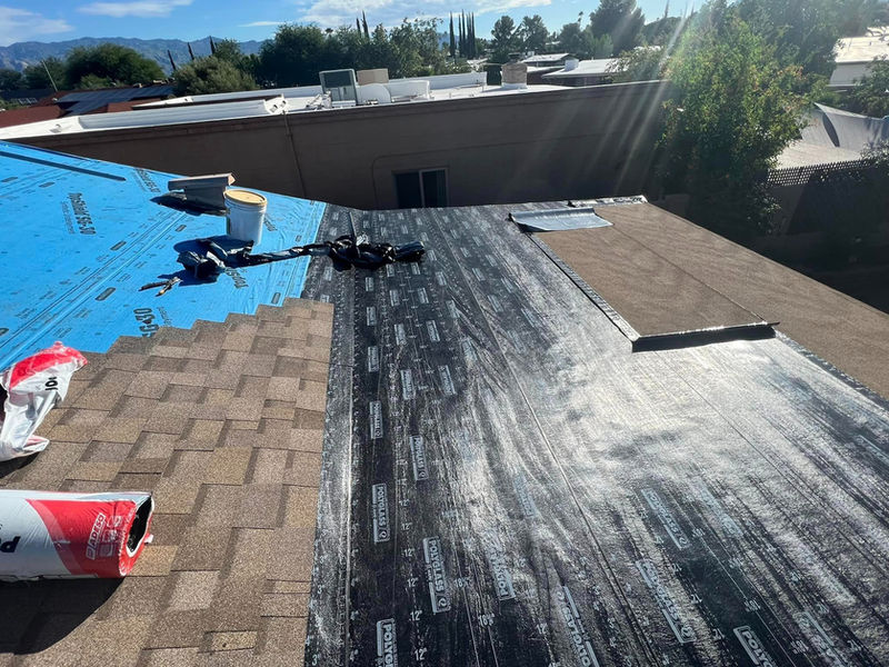 Old shingles removed and new underlayment installed