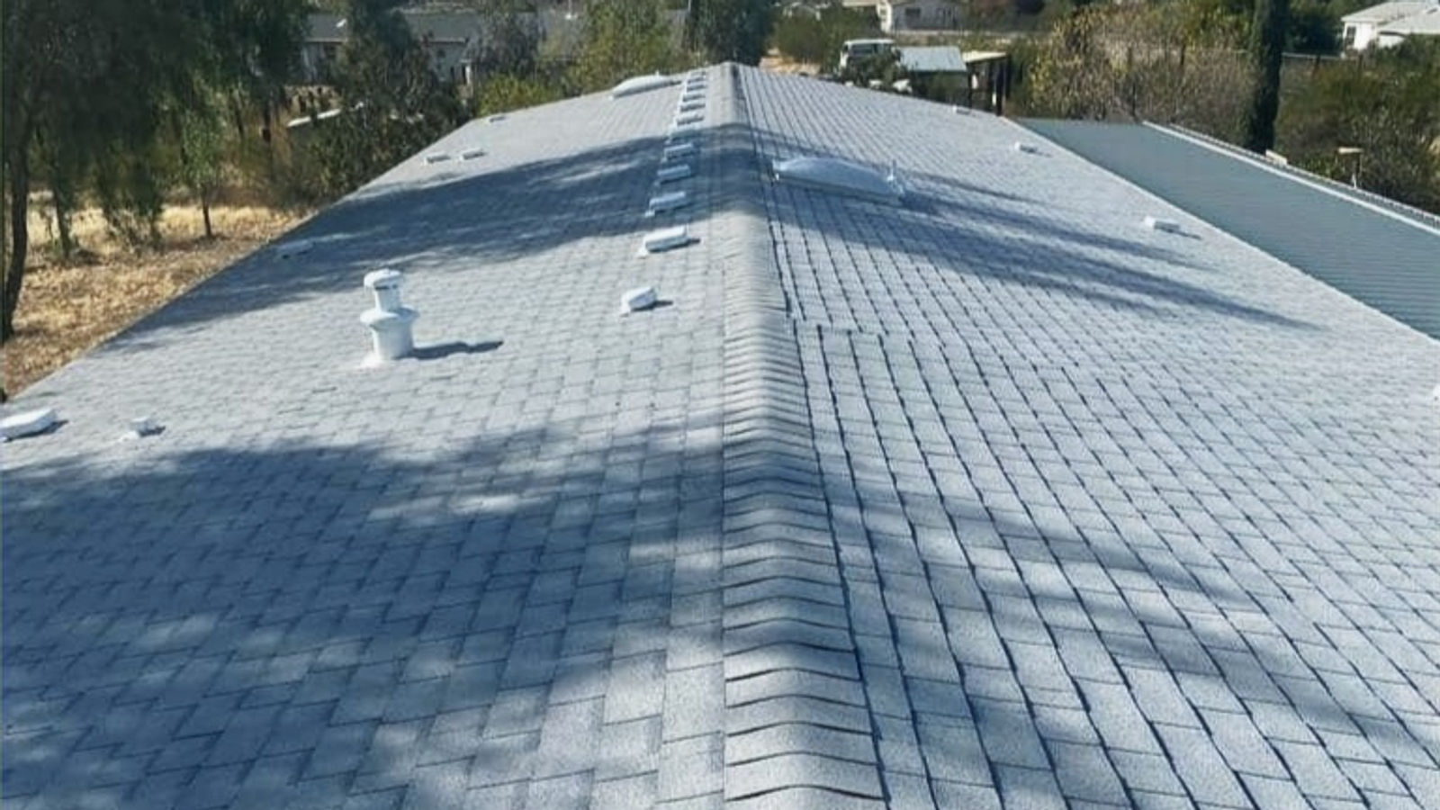 Shingle roof ridge line on a home in the Vail area southeast of Tucson
