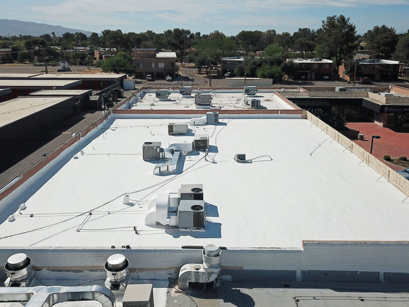 Elastomeric coating applied across a large commercial roof