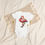 Thumbnail: Organic cotton baby bodysuit, iridecent pink flamingo