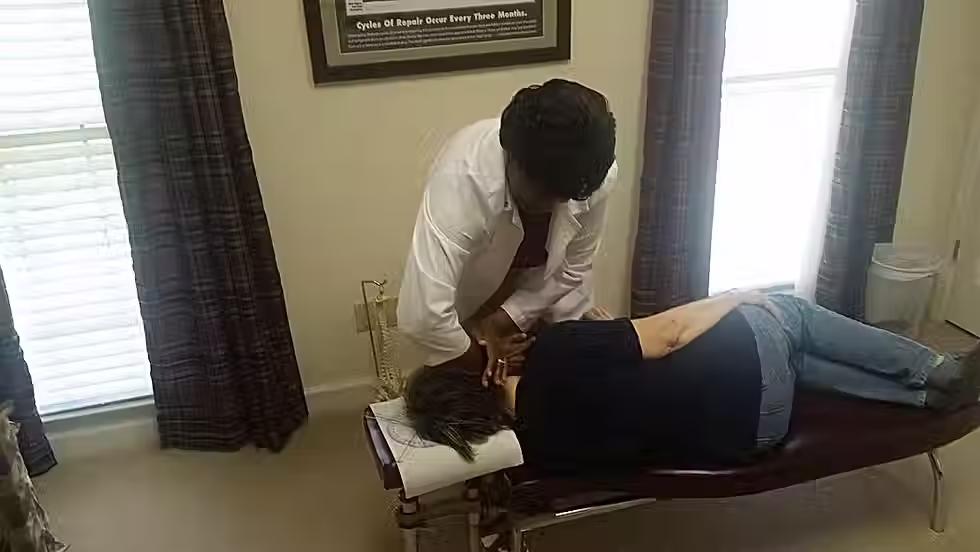 Eye-level view of a chiropractic adjustment in progress