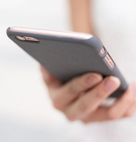 woman-sending-sms-on-cellphone-2022-12-15-21-07-51-utc.jpg