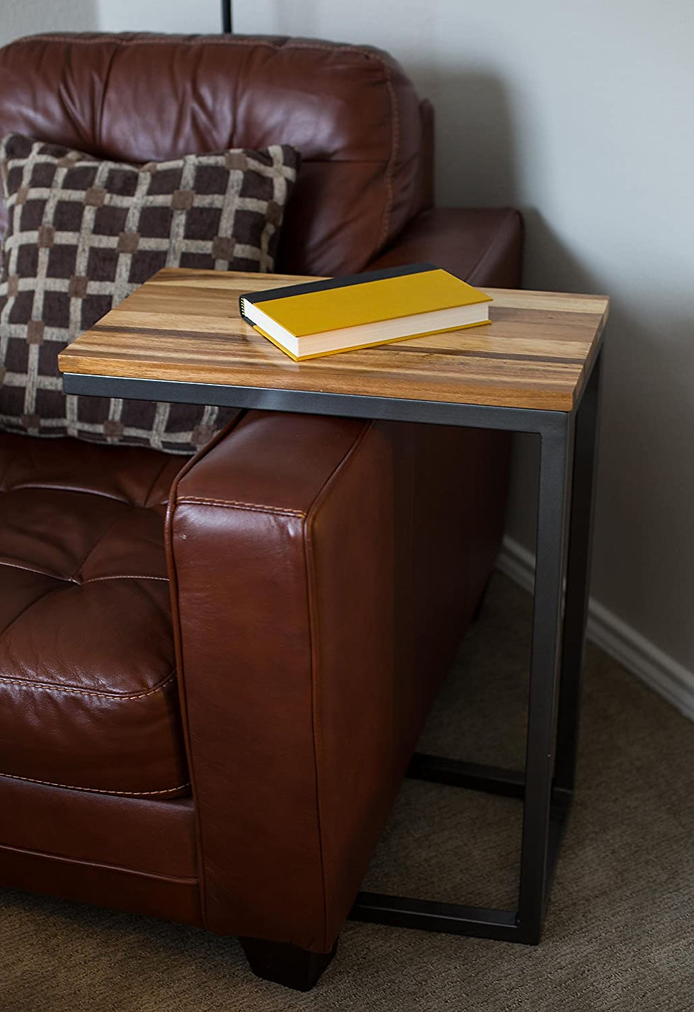yellow journal note book on a side table