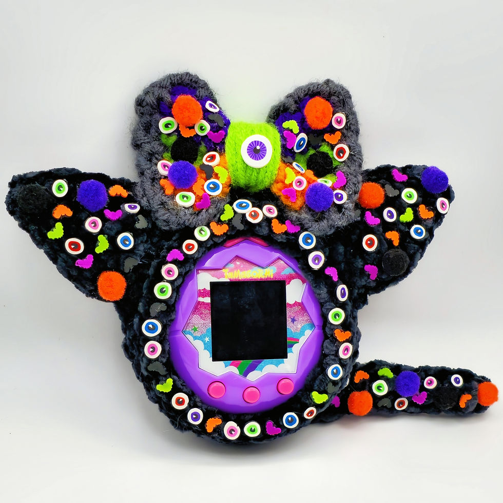 Thumbnail: Spooky Pom Pom Velvet Tamagotchi Cover