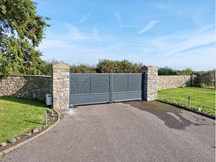 Automatic double leaf swing gate installation, South Wales. www.gate-systems.com