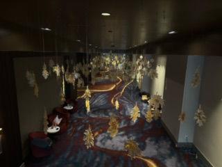 Custom leaf sculpture installation gracefully adorns the lobby ceiling, creating an enchanting and immersive autumn atmosphere.