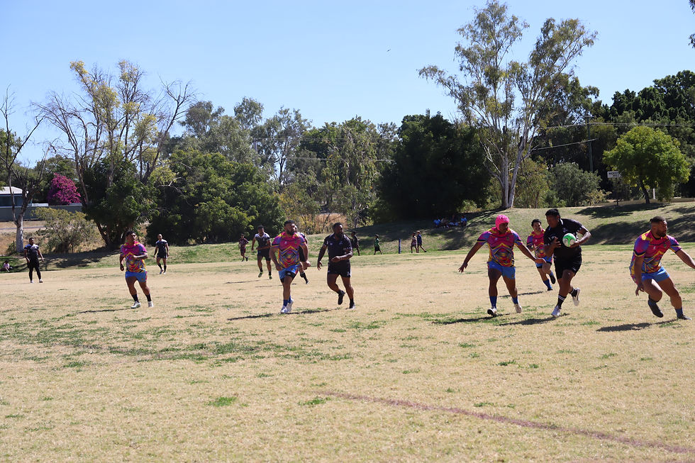 Inoke Temo charging through the Tuvaluan defense