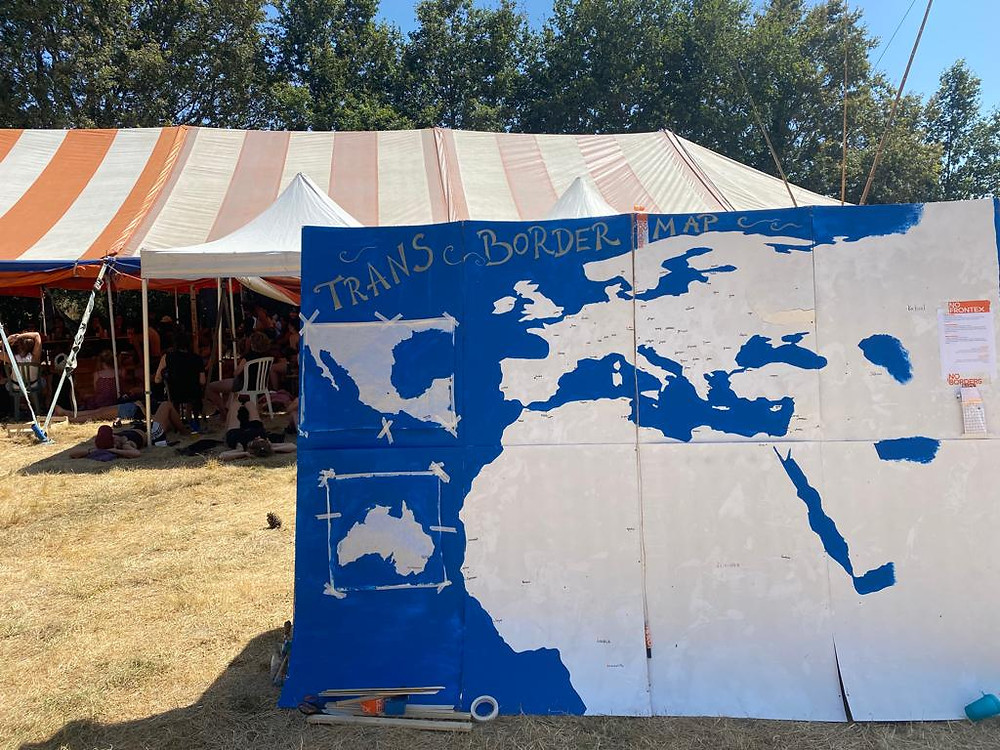 Map in front of a tent where the meetings took place