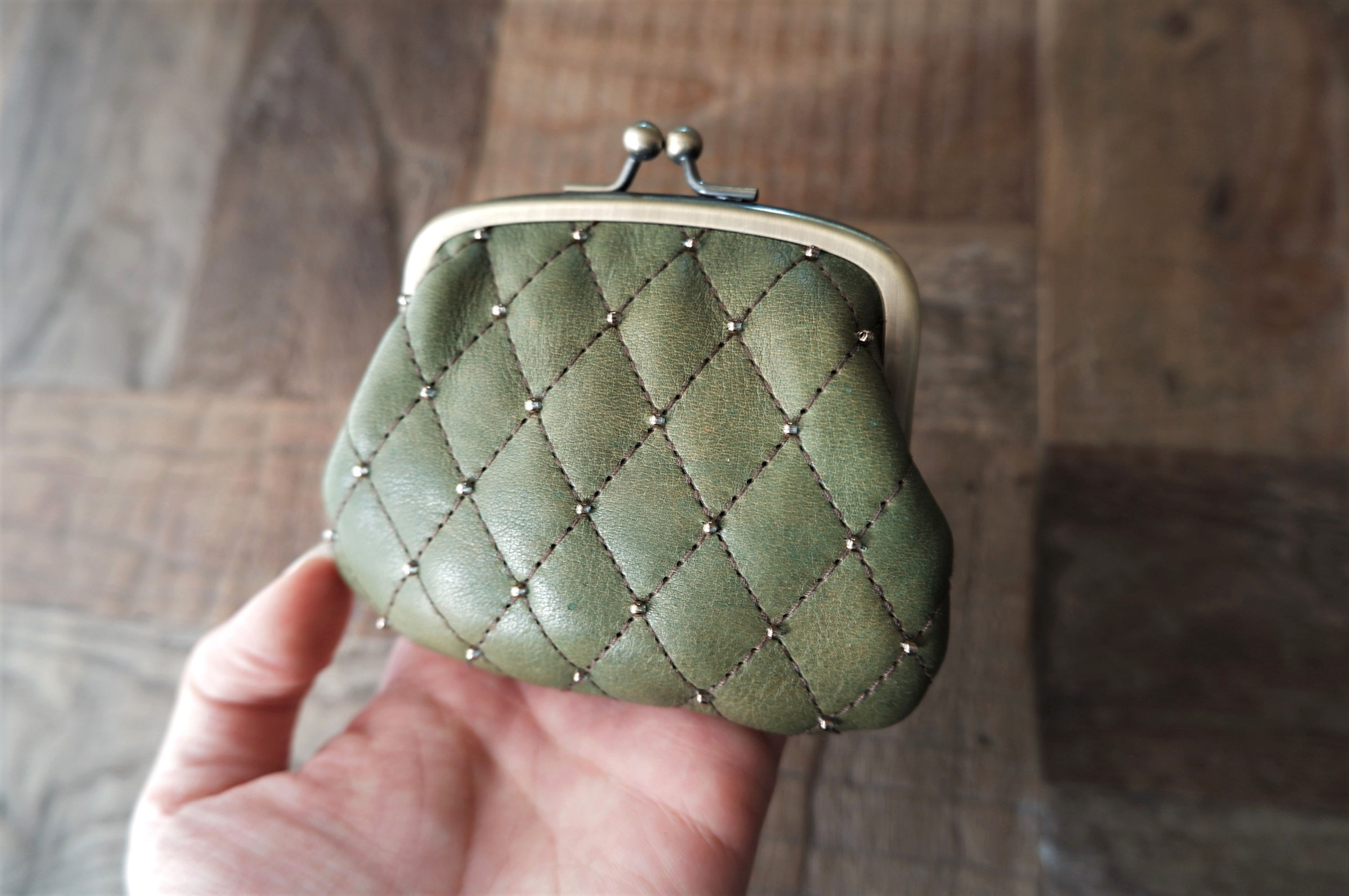 green quilting leather coin purse