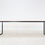 Thumbnail: minimalistische design eettafel met zwart onderstel in staal en licht eiken blad