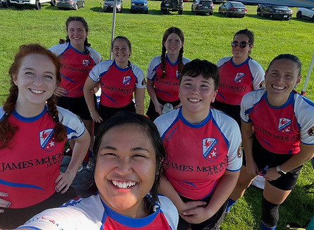 Rocktown women's rugby team smiles for a photo