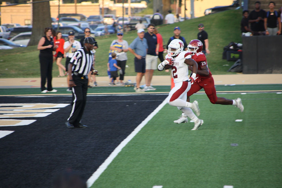 Munford’s Tay Starks scores 1 of their 4 rushing touchdowns against Crockett Co.