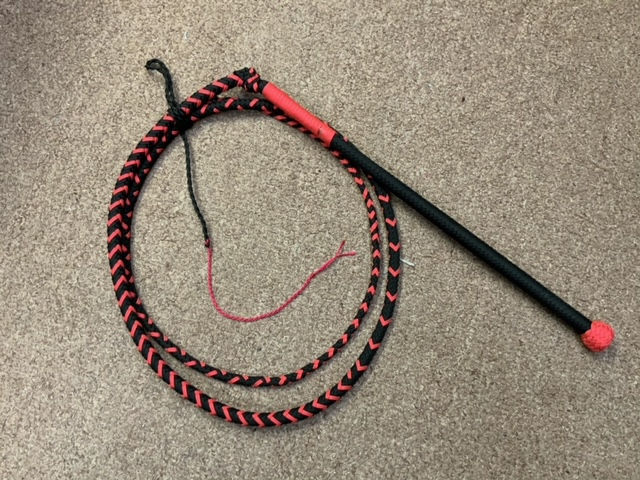 stockwhip, black w/neon pink