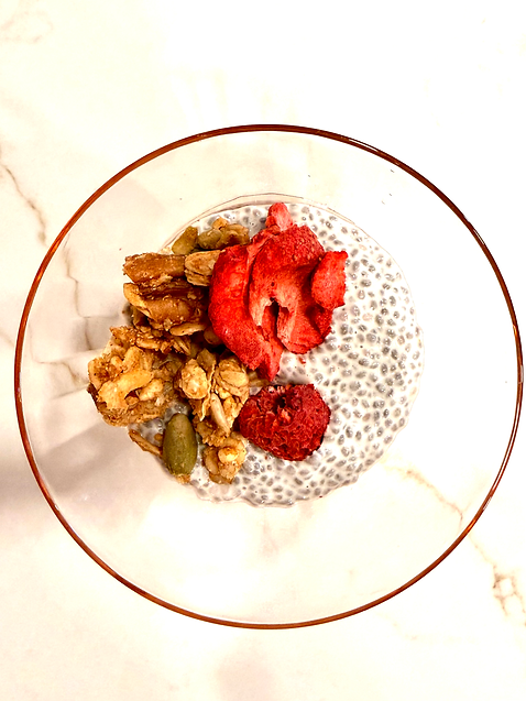 Chia pudding with toasted nuts and seeds with freeze dried berries.