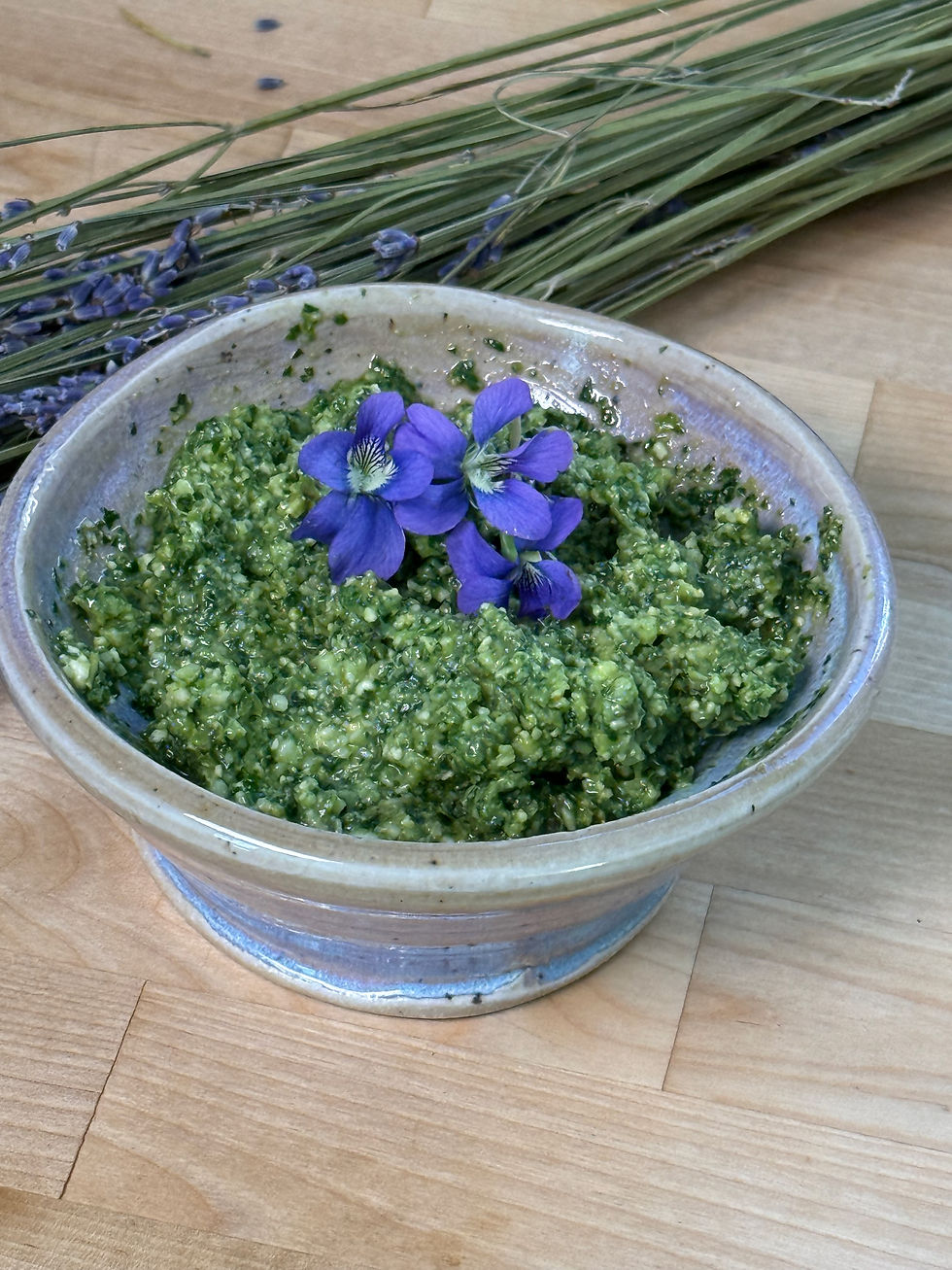 ceramic bowl of wild greens pesto