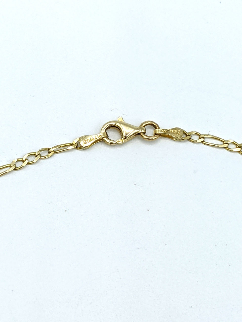 Thumbnail: Clasp of a 20 inch 10k yellow gold Figaro neckchain