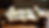 Eye-level view of open Torah scroll on wooden table