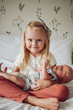 Lo and her new baby cousin!