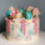 Textured Buttercream drip cake with macarons and roses