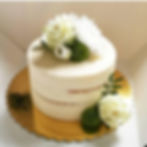 Semi naked buttercream cake with fresh flowers