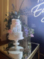 Floral ruffle wedding cake