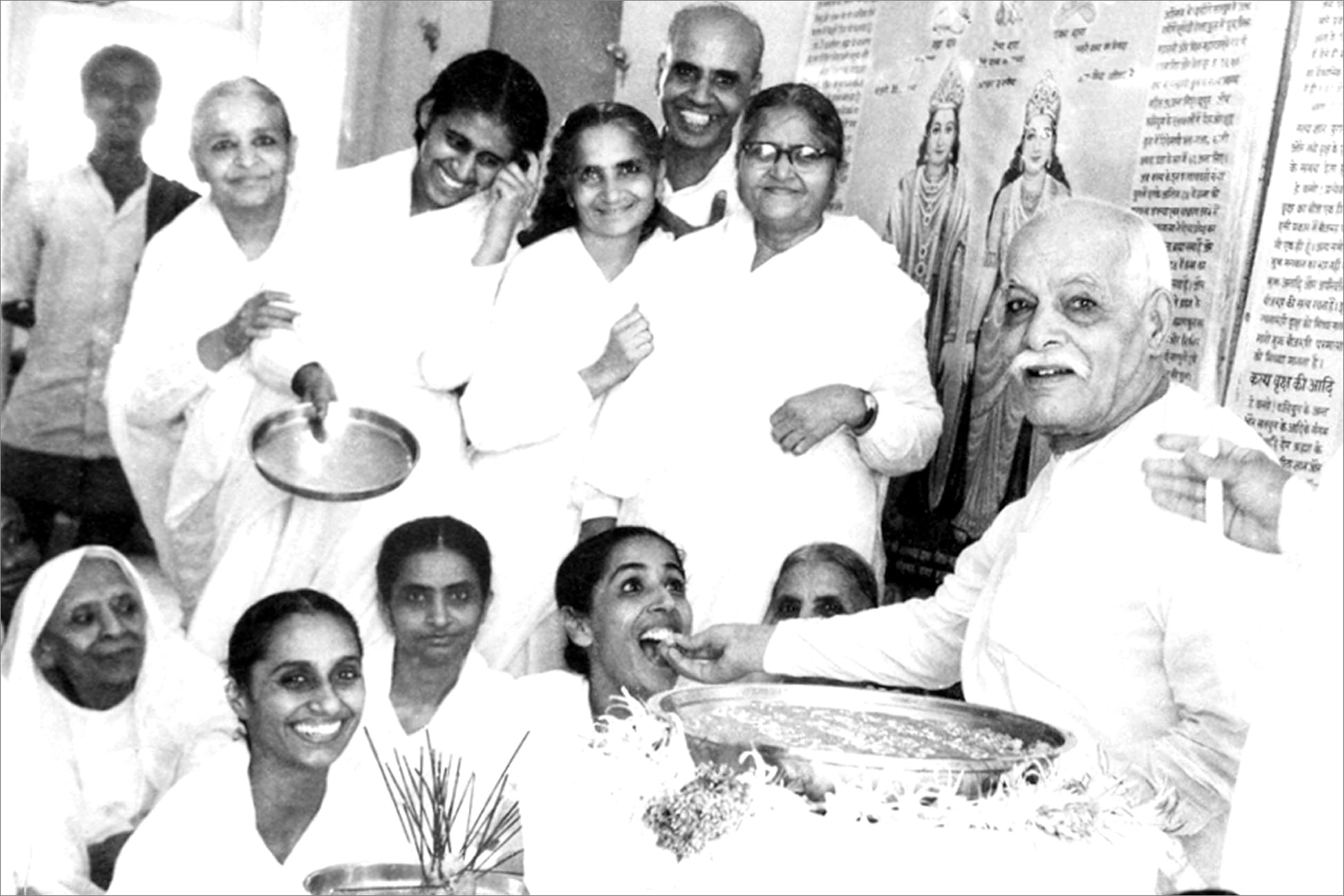 BaapDada giving Toli after Murli