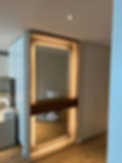 Bespoke wall mounted shelf full height mirror backlit luxury joinery interior design HM Joiners Ltd