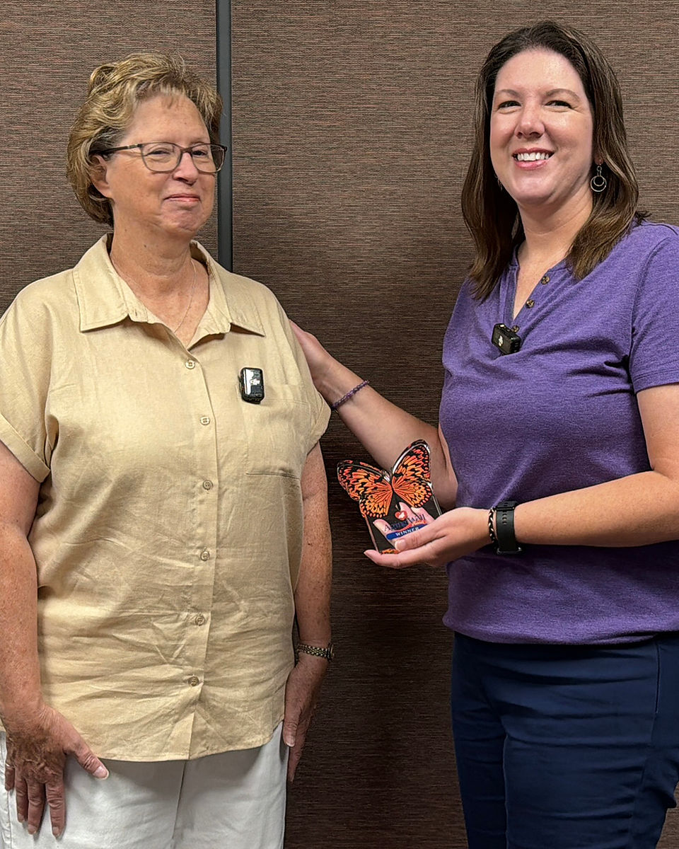Peggy Gaines and Leah smiling together with Peggy’s August 2026 Aging Well Award.