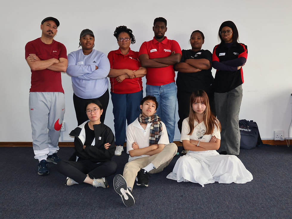 Four unforgettable weeks together: Anya, Andy, and Emily (left to right) with the YMCA Nelson Mandela Bay team on their last day.