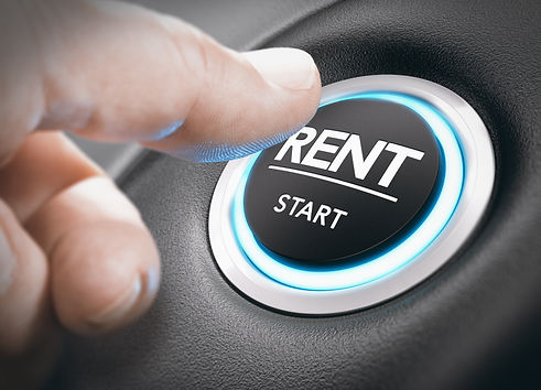Man pushing a start button with the word rent. concept of car or vehicle rental. Composite