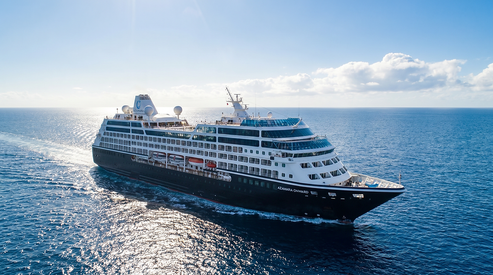 The Azamara Onward cruise ship sailing on a calm blue sea.