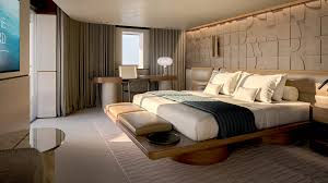 Modern luxury suite on Explora III with a double bed.