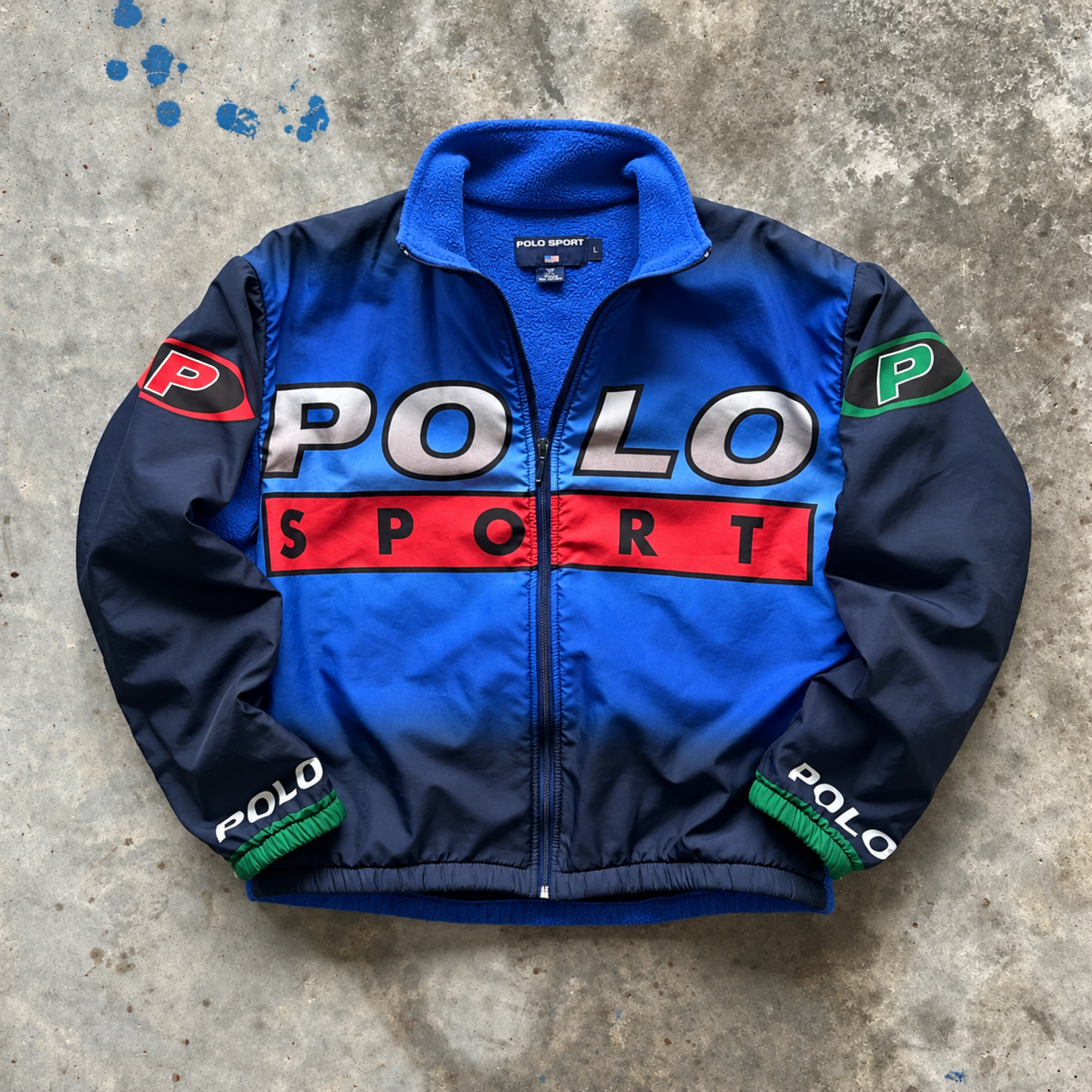 Polo Sport blue jacket with bold graphic panels