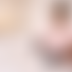 A photo of african american woman wearing gloves preparing products on a clean treatment tray.
