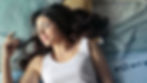 A woman who has learned how to use nasya oil for better sleep