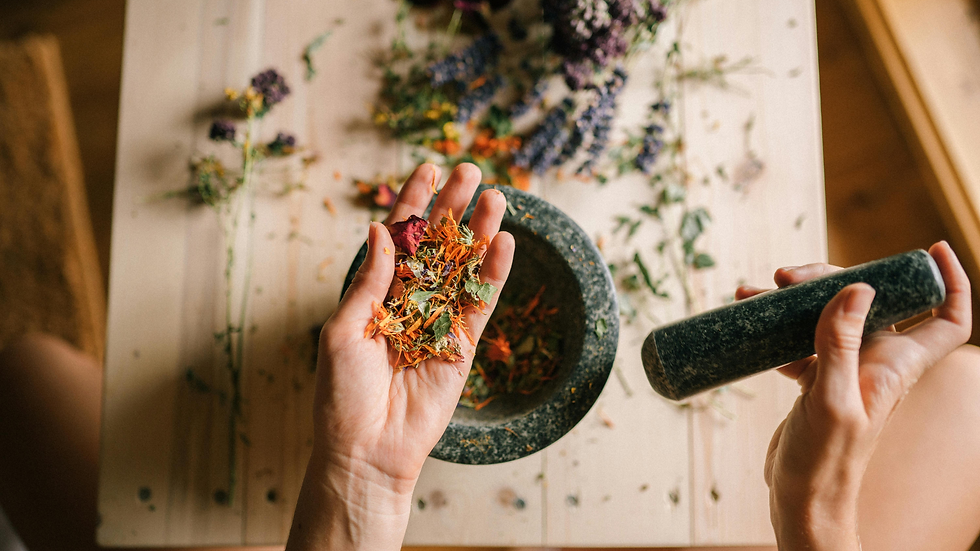 Natural Ayurvedic healing setup featuring a wooden table with fresh herbs, traditional wellness ingredients, and holistic medicine preparation elements