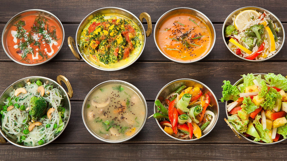 Bowls of fresh, nourishing Ayurvedic meals arranged with seasonal vegetables, grains, and warming spices, representing a balanced and sustainable 7-day spring reset focused on gentle cleansing and digestion support.