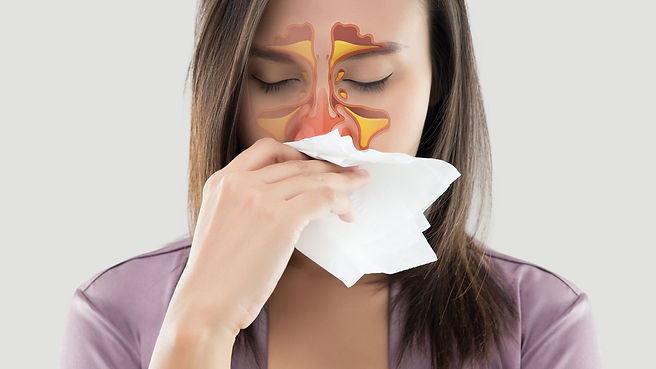 woman sneezing